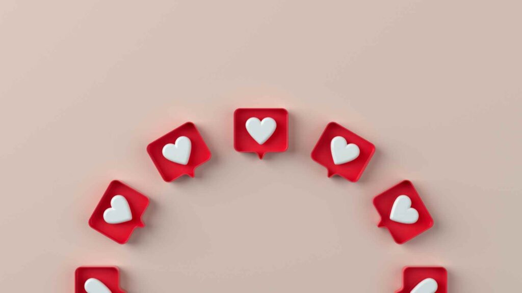 3D red social media notification icons with white heart symbols arranged in a semi-circle on a light beige background