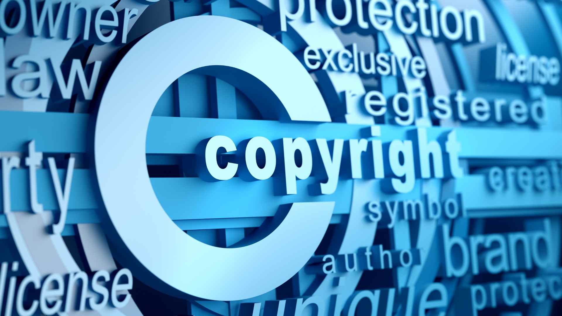Copyright symbol surrounded by legal and intellectual property terms