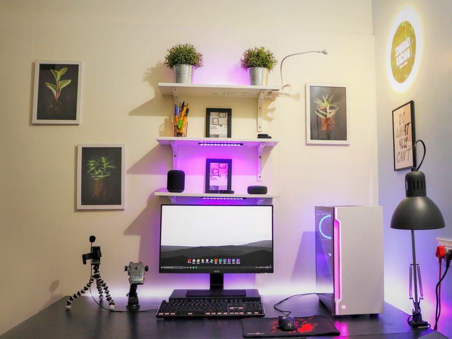 Minimalist home office setup with modern tech, ideal for creative and organized workspaces.