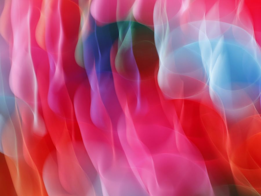 Abstract colorful light waves create a dynamic and vibrant visual experience.