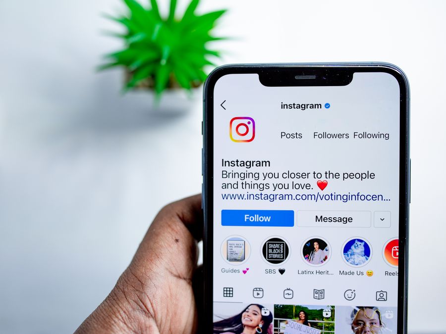 Close-up of a smartphone displaying the Instagram app, emphasizing social media connection.