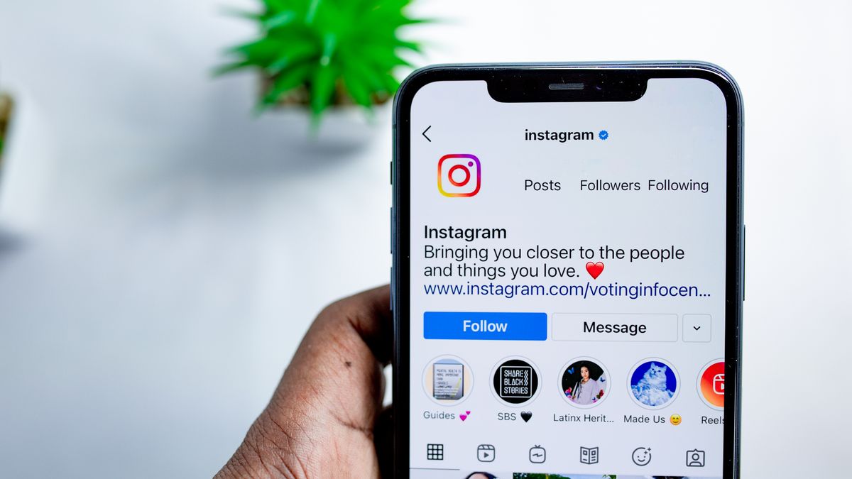 Close-up of a smartphone displaying the Instagram app, emphasizing social media connection.
