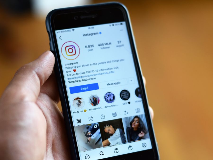 Close-up of a smartphone displaying an Instagram profile screen.